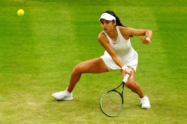 Mandatory Credit: Photo by Javier Garcia Shutterstock (12196117mg) Emma Raducanu during her fourth round match Wimbledon Tennis Championships, Day 7, The All England Lawn Tennis and Croquet Club, London, UK - 05 Jul 2021 Wimbledon Tennis Championships, Day 7, The All England Lawn Tennis and Croquet Club, London, UK - 05 Jul 2021  Copyright: xJavierxGarcia Shutterstockx 12196117mg