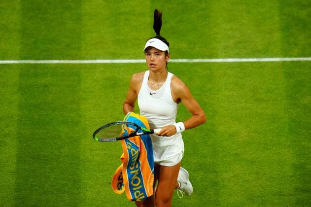 Mandatory Credit: Photo by Javier Garcia Shutterstock (12196117na) Emma Raducanu during her fourth round match Wimbledon Tennis Championships, Day 7, The All England Lawn Tennis and Croquet Club, London, UK - 05 Jul 2021 Wimbledon Tennis Championships, Day 7, The All England Lawn Tennis and Croquet Club, London, UK - 05 Jul 2021  Copyright: xJavierxGarcia Shutterstockx 12196117na