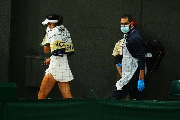 Mandatory Credit: Photo by Javier Garcia Shutterstock (12196117nm) Emma Raducanu walks off for medical treatment during her fourth round match Wimbledon Tennis Championships, Day 7, The All England Lawn Tennis and Croquet Club, London, UK - 05 Jul 2021 Wimbledon Tennis Championships, Day 7, The All England Lawn Tennis and Croquet Club, London, UK - 05 Jul 2021  Copyright: xJavierxGarcia Shutterstockx 12196117nm