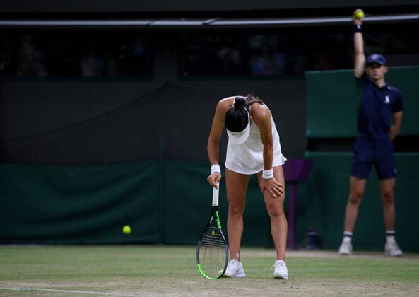 Mandatory Credit: Photo by Shutterstock (12196120bs) Emma Raducanu of Great Britain in pain Wimbledon Tennis Championships, Day 7, The All England Lawn Tennis and Croquet Club, London, UK - 05 Jul 2021 Wimbledon Tennis Championships, Day 7, The All England Lawn Tennis and Croquet Club, London, UK - 05 Jul 2021  Copyright: xShutterstockx 12196120bs