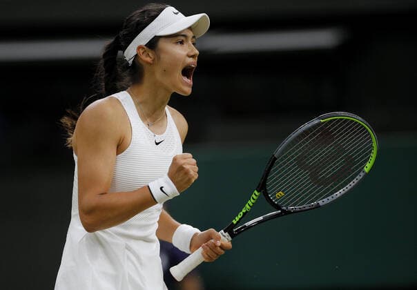 Mandatory Credit: Photo by Shutterstock (12196120aq) Emma Raducanu of Great Britain celebrates Wimbledon Tennis Championships, Day 7, The All England Lawn Tennis and Croquet Club, London, UK - 05 Jul 2021 Wimbledon Tennis Championships, Day 7, The All England Lawn Tennis and Croquet Club, London, UK - 05 Jul 2021  Copyright: xShutterstockx 12196120aq