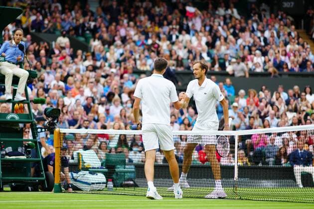 Mandatory Credit: Photo by Javier Garcia Shutterstock (12197711k) Hubert Hurkacz celebrates victory in his fourth round match and is congratulated by Daniil Medvedev Wimbledon Tennis Championships, Day 8, The All England Lawn Tennis and Croquet Club, London, UK - 06 Jul 2021 Wimbledon Tennis Championships, Day 8, The All England Lawn Tennis and Croquet Club, London, UK - 06 Jul 2021  Copyright: xJavierxGarcia Shutterstockx 12197711k