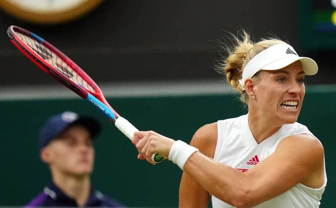 Mandatory Credit: Photo by Shutterstock (12197712ao) Angelique Kerber during her quarter-final match Wimbledon Tennis Championships, Day 8, The All England Lawn Tennis and Croquet Club, London, UK - 06 Jul 2021 Wimbledon Tennis Championships, Day 8, The All England Lawn Tennis and Croquet Club, London, UK - 06 Jul 2021  Copyright: xShutterstockx 12197712ao