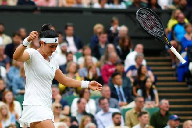 Mandatory Credit: Photo by Javier Garcia Shutterstock (12197711dz) Ons Jabeur throws her racquet during her quarter-final match Wimbledon Tennis Championships, Day 8, The All England Lawn Tennis and Croquet Club, London, UK - 06 Jul 2021 Wimbledon Tennis Championships, Day 8, The All England Lawn Tennis and Croquet Club, London, UK - 06 Jul 2021  Copyright: xJavierxGarcia Shutterstockx 12197711dz