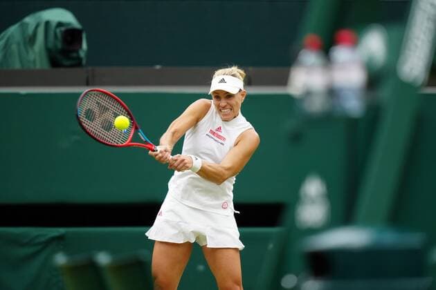 Mandatory Credit: Photo by Shutterstock (12197712be) Angelique Kerber during her quarter-final match Wimbledon Tennis Championships, Day 8, The All England Lawn Tennis and Croquet Club, London, UK - 06 Jul 2021 Wimbledon Tennis Championships, Day 8, The All England Lawn Tennis and Croquet Club, London, UK - 06 Jul 2021  Copyright: xShutterstockx 12197712be