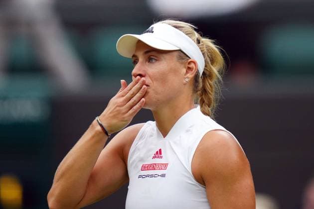 Mandatory Credit: Photo by Shutterstock (12197712cc) Angelique Kerber celebrates victory in her quarter-final match Wimbledon Tennis Championships, Day 8, The All England Lawn Tennis and Croquet Club, London, UK - 06 Jul 2021 Wimbledon Tennis Championships, Day 8, The All England Lawn Tennis and Croquet Club, London, UK - 06 Jul 2021  Copyright: xShutterstockx 12197712cc