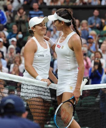 Lawn Tennis - 2021 All England Championships - Week Two - Tuesday - Wimbledon Ladies - Ashley Barty v Ajia Tomljanovic Ashley Barty is congratulated by fellow Australian Ajia Tomljanovic at the net after the net 