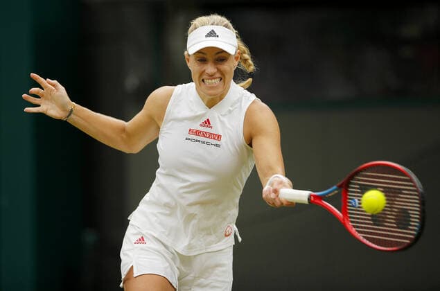 Mandatory Credit: Photo by Shutterstock (12197713ae) Angelique Kerber of Germany in action Wimbledon Tennis Championships, Day 8, The All England Lawn Tennis and Croquet Club, London, UK - 06 Jul 2021 Wimbledon Tennis Championships, Day 8, The All England Lawn Tennis and Croquet Club, London, UK - 06 Jul 2021  Copyright: xShutterstockx 12197713ae