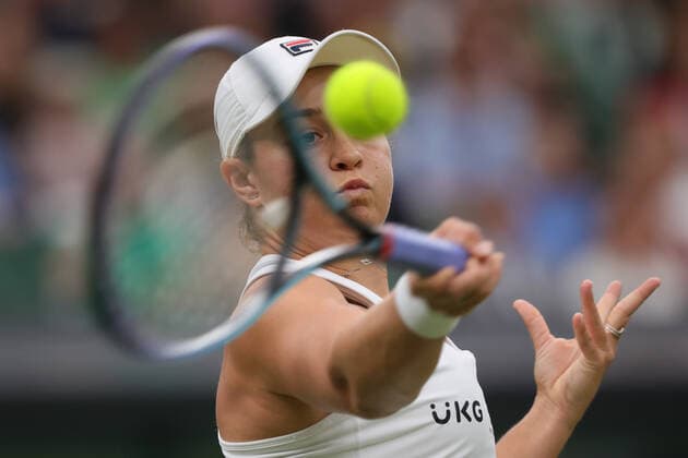 (210707) -- LONDON, July 7, 2021 -- Ashleigh Barty of Australia hits a return during the woman s quarterfinal match between Ashleigh Barty of Australia and Ajla Tomljanovic of Australia at Wimbledon tennis Championship in London, Britain, on July 6, 2021. (Photo by Xinhua) (SP)BRITAIN-LONDON-TENNIS-WIMBLEDON TimxIreland 