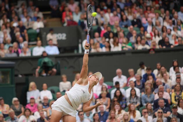 (210707) -- LONDON, July 7, 2021 -- Ashleigh Barty of Australia serves during the woman s quarterfinal match between Ashleigh Barty of Australia and Ajla Tomljanovic of Australia at Wimbledon tennis Championship in London, Britain, on July 6, 2021. (Photo by Xinhua) (SP)BRITAIN-LONDON-TENNIS-WIMBLEDON TimxIreland 