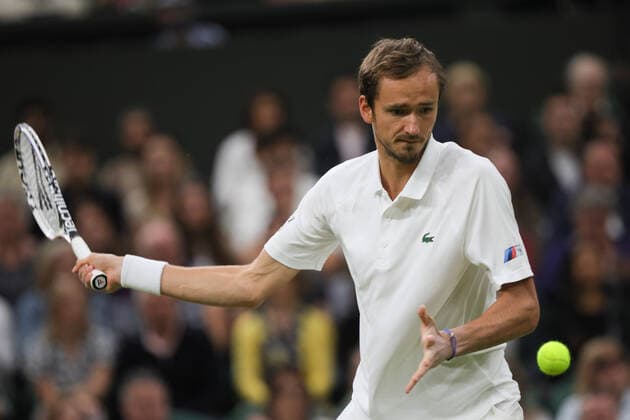 (210707) -- LONDON, July 7, 2021 -- Daniil Medvedev of Russia hits a return during the men s singles fourth round match between Hubert Hurkacz of Poland and Daniil Medvedev of Russia at Wimbledon tennis Championship in London, Britain, on July 6, 2021. (Photo by Xinhua) (SP)BRITAIN-LONDON-TENNIS-WIMBLEDON TimxIreland 