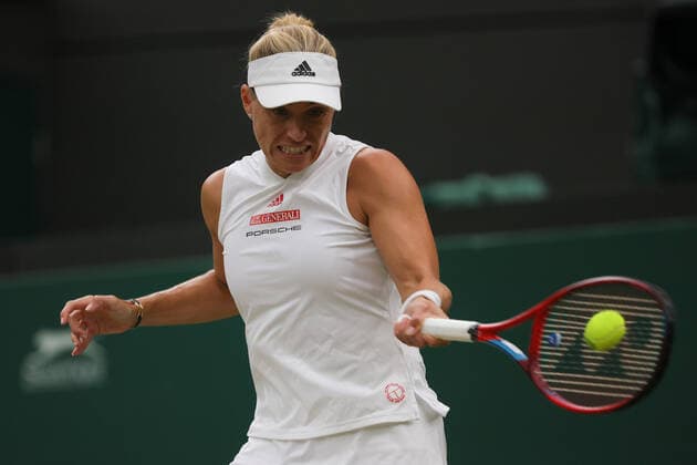 (210707) -- LONDON, July 7, 2021 -- Angelique Kerber of Germany hits a return during the woman s quarterfinal match between Karolina Muchova of the Czech Republic and Angelique Kerber of Germany at Wimbledon tennis Championship in London, Britain, on July 6, 2021. (Photo by Xinhua) (SP)BRITAIN-LONDON-TENNIS-WIMBLEDON TimxIreland 