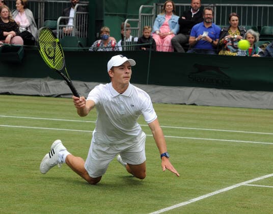 Lawn Tennis - 2021 All England Championships - Week Two - Wednesday - Wimbledon Boys event - Oliver Tarvet v Viacheslav Bielinskyi Oliver Tarvet of GBR slips on the grass 
