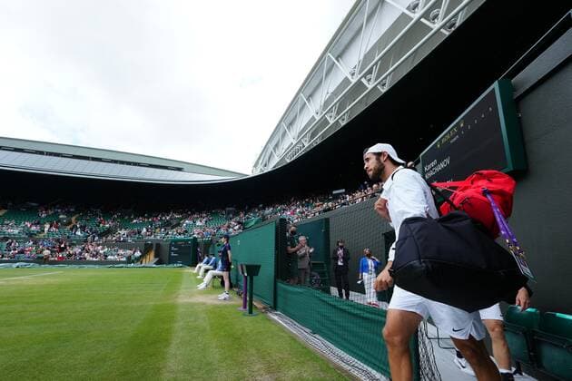 Mandatory Credit: Photo by Shutterstock (12199111a) Denis Shapovalov and Karen Khachanov walk onto court for their quarter-final match Wimbledon Tennis Championships, Day 9, The All England Lawn Tennis and Croquet Club, London, UK - 07 Jul 2021 Wimbledon Tennis Championships, Day 9, The All England Lawn Tennis and Croquet Club, London, UK - 07 Jul 2021  Copyright: xShutterstockx 12199111a