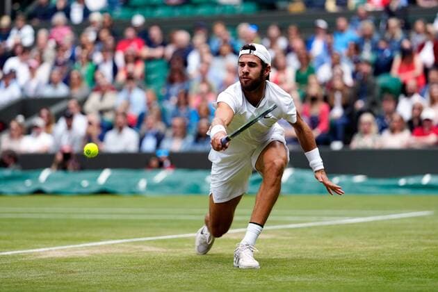 Mandatory Credit: Photo by Shutterstock (12199111d) Karen Khachanov during his quarter-final match Wimbledon Tennis Championships, Day 9, The All England Lawn Tennis and Croquet Club, London, UK - 07 Jul 2021 Wimbledon Tennis Championships, Day 9, The All England Lawn Tennis and Croquet Club, London, UK - 07 Jul 2021  Copyright: xShutterstockx 12199111d