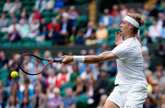 Mandatory Credit: Photo by Shutterstock (12199111f) Denis Shapovalov during his quarter-final match Wimbledon Tennis Championships, Day 9, The All England Lawn Tennis and Croquet Club, London, UK - 07 Jul 2021 Wimbledon Tennis Championships, Day 9, The All England Lawn Tennis and Croquet Club, London, UK - 07 Jul 2021  Copyright: xShutterstockx 12199111f