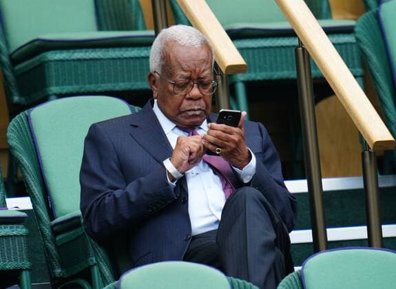 Mandatory Credit: Photo by Javier Garcia Shutterstock (12199110a) Trevor McDonald in the Royal Box on Centre Court Wimbledon Tennis Championships, Day 9, The All England Lawn Tennis and Croquet Club, London, UK - 07 Jul 2021 Wimbledon Tennis Championships, Day 9, The All England Lawn Tennis and Croquet Club, London, UK - 07 Jul 2021  Copyright: xJavierxGarcia Shutterstockx 12199110a