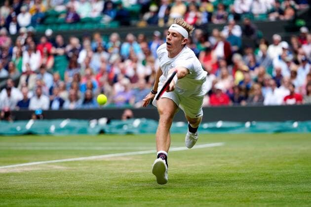 Mandatory Credit: Photo by Shutterstock (12199111g) Denis Shapovalov during his quarter-final match Wimbledon Tennis Championships, Day 9, The All England Lawn Tennis and Croquet Club, London, UK - 07 Jul 2021 Wimbledon Tennis Championships, Day 9, The All England Lawn Tennis and Croquet Club, London, UK - 07 Jul 2021  Copyright: xShutterstockx 12199111g