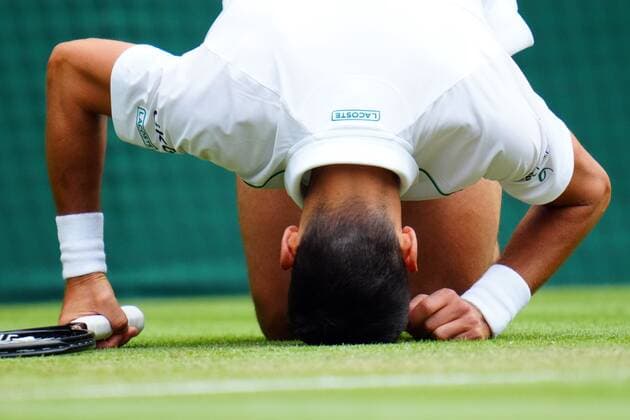 Mandatory Credit: Photo by Javier Garcia Shutterstock (12199110bc) Novak Djokovic slipping over during his quarter-final match Wimbledon Tennis Championships, Day 9, The All England Lawn Tennis and Croquet Club, London, UK - 07 Jul 2021 Wimbledon Tennis Championships, Day 9, The All England Lawn Tennis and Croquet Club, London, UK - 07 Jul 2021  Copyright: xJavierxGarcia Shutterstockx 12199110bc