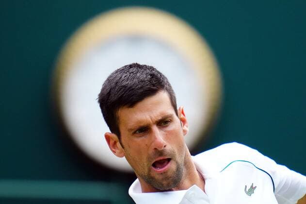 Mandatory Credit: Photo by Javier Garcia Shutterstock (12199110bi) Novak Djokovic during his quarter-final match Wimbledon Tennis Championships, Day 9, The All England Lawn Tennis and Croquet Club, London, UK - 07 Jul 2021 Wimbledon Tennis Championships, Day 9, The All England Lawn Tennis and Croquet Club, London, UK - 07 Jul 2021  Copyright: xJavierxGarcia Shutterstockx 12199110bi