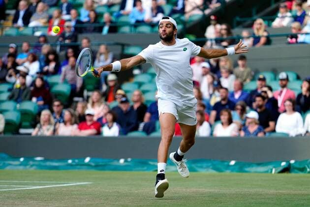 Mandatory Credit: Photo by Shutterstock (12199111gl) Matteo Berrettini during his quarter-final match Wimbledon Tennis Championships, Day 9, The All England Lawn Tennis and Croquet Club, London, UK - 07 Jul 2021 Wimbledon Tennis Championships, Day 9, The All England Lawn Tennis and Croquet Club, London, UK - 07 Jul 2021  Copyright: xShutterstockx 12199111gl