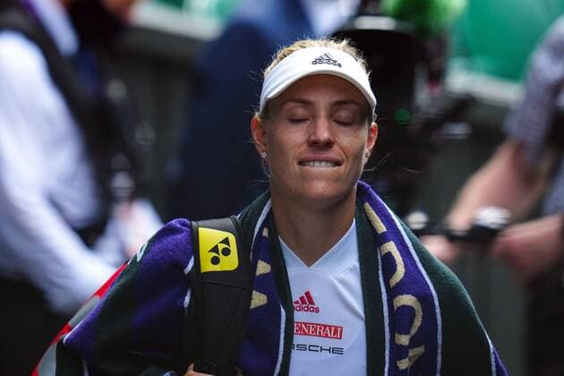 Mandatory Credit: Photo by Javier Garcia Shutterstock (12200578bp) Angelique Kerber dejected after defeat in her semi-final match Wimbledon Tennis Championships, Day 10, The All England Lawn Tennis and Croquet Club, London, UK - 08 Jul 2021 Wimbledon Tennis Championships, Day 10, The All England Lawn Tennis and Croquet Club, London, UK - 08 Jul 2021  Copyright: xJavierxGarcia Shutterstockx 12200578bp