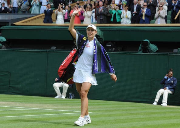Lawn Tennis - 2021 All England Championships - Week Two - Thursday - Wimbledon - Ladies Semi Final . Ashleigh Barty v Angelique Kerber Angelique Kerber waves to the crowd after defeat 