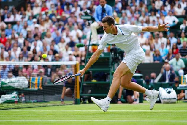 Mandatory Credit: Photo by Javier Garcia Shutterstock (12202131bm) Hubert Hurkacz during his semi-final match Wimbledon Tennis Championships, Day 11, The All England Lawn Tennis and Croquet Club, London, UK - 09 Jul 2021 Wimbledon Tennis Championships, Day 11, The All England Lawn Tennis and Croquet Club, London, UK - 09 Jul 2021  Copyright: xJavierxGarcia Shutterstockx 12202131bm