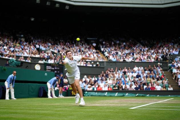 Mandatory Credit: Photo by Shutterstock (12202136ah) Hubert Hurkacz during his semi-final match Wimbledon Tennis Championships, Day 11, The All England Lawn Tennis and Croquet Club, London, UK - 09 Jul 2021 Wimbledon Tennis Championships, Day 11, The All England Lawn Tennis and Croquet Club, London, UK - 09 Jul 2021  Copyright: xShutterstockx 12202136ah