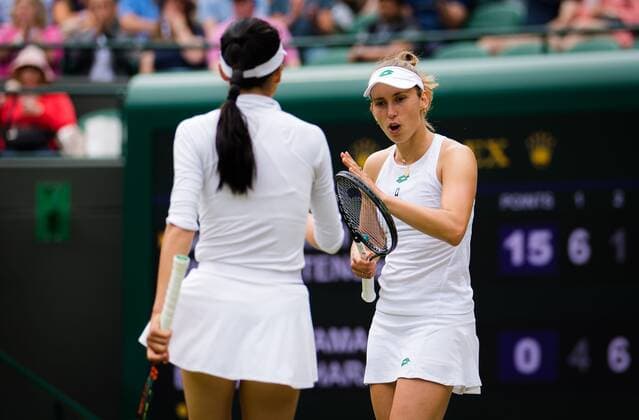 Mandatory Credit: Photo by Rob Prange Shutterstock (12202162s) Elise Mertens of Belgium & Su-Wei Hsieh of Chinese Taipeh in actin during the doubles semi-final of the 2021 Wimbledon Championships Grand Slam tennis tournament Wimbledon Tennis Championships, Day 11, The All England Lawn Tennis and Croquet Club, London, UK - 09 Jul 2021 Wimbledon Tennis Championships, Day 11, The All England Lawn Tennis and Croquet Club, London, UK - 09 Jul 2021  Copyright: xRobxPrange Shutterstockx 12202162s