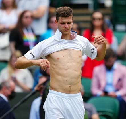 Mandatory Credit: Photo by Javier Garcia Shutterstock (12202131dd) Hubert Hurkacz changes his shirt during his semi-final match Wimbledon Tennis Championships, Day 11, The All England Lawn Tennis and Croquet Club, London, UK - 09 Jul 2021 Wimbledon Tennis Championships, Day 11, The All England Lawn Tennis and Croquet Club, London, UK - 09 Jul 2021  Copyright: xJavierxGarcia Shutterstockx 12202131dd