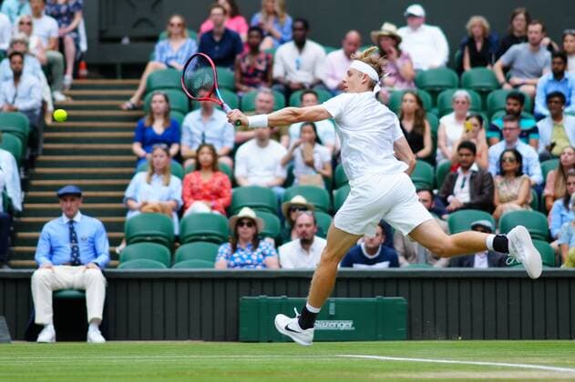 Mandatory Credit: Photo by Javier Garcia Shutterstock (12202131ev) Denis Shapovalov during his semi-final match Wimbledon Tennis Championships, Day 11, The All England Lawn Tennis and Croquet Club, London, UK - 09 Jul 2021 Wimbledon Tennis Championships, Day 11, The All England Lawn Tennis and Croquet Club, London, UK - 09 Jul 2021  Copyright: xJavierxGarcia Shutterstockx 12202131ev