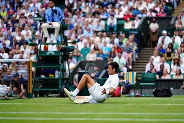 Mandatory Credit: Photo by Shutterstock (12202136cz) Novak Djokovic slipping over during his semi-final match Wimbledon Tennis Championships, Day 11, The All England Lawn Tennis and Croquet Club, London, UK - 09 Jul 2021 Wimbledon Tennis Championships, Day 11, The All England Lawn Tennis and Croquet Club, London, UK - 09 Jul 2021  Copyright: xShutterstockx 12202136cz
