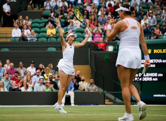 Mandatory Credit: Photo by Rob Prange Shutterstock (12202162ai) Storm Sanders of Australia & Caroline Dolehide of the United States in action during the doubles semi-final of the 2021 Wimbledon Championships Grand Slam tennis tournament Wimbledon Tennis Championships, Day 11, The All England Lawn Tennis and Croquet Club, London, UK - 09 Jul 2021 Wimbledon Tennis Championships, Day 11, The All England Lawn Tennis and Croquet Club, London, UK - 09 Jul 2021  Copyright: xRobxPrange Shutterstockx 12202162ai
