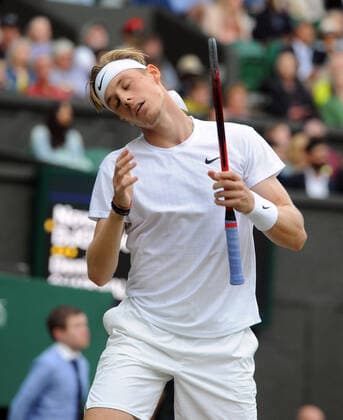 Lawn Tennis - 2021 All England Championships - Week Two - Friday - Wimbledon Mens Semi Final - Novak Djokovic v Denis Shapovalov Denis Shapovalov shows his despair after the lose of the set 