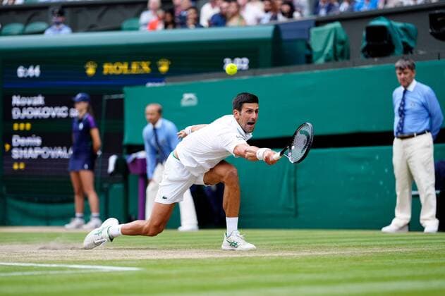 Mandatory Credit: Photo by Shutterstock (12202136dm) Novak Djokovic during his semi-final match Wimbledon Tennis Championships, Day 11, The All England Lawn Tennis and Croquet Club, London, UK - 09 Jul 2021 Wimbledon Tennis Championships, Day 11, The All England Lawn Tennis and Croquet Club, London, UK - 09 Jul 2021  Copyright: xShutterstockx 12202136dm