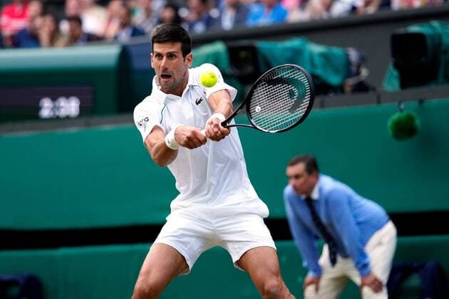 Mandatory Credit: Photo by Shutterstock (12202136ej) Novak Djokovic during his semi-final match Wimbledon Tennis Championships, Day 11, The All England Lawn Tennis and Croquet Club, London, UK - 09 Jul 2021 Wimbledon Tennis Championships, Day 11, The All England Lawn Tennis and Croquet Club, London, UK - 09 Jul 2021  Copyright: xShutterstockx 12202136ej