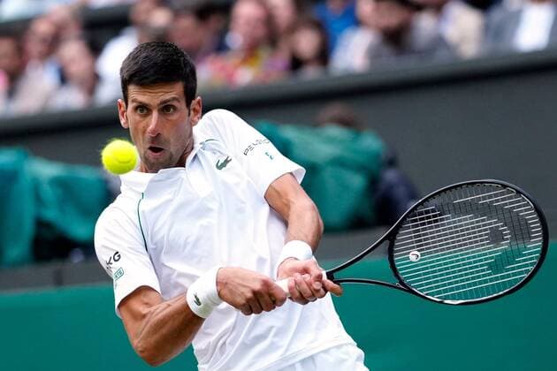 Mandatory Credit: Photo by Shutterstock (12202136fk) Novak Djokovic during his semi-final match Wimbledon Tennis Championships, Day 11, The All England Lawn Tennis and Croquet Club, London, UK - 09 Jul 2021 Wimbledon Tennis Championships, Day 11, The All England Lawn Tennis and Croquet Club, London, UK - 09 Jul 2021  Copyright: xShutterstockx 12202136fk