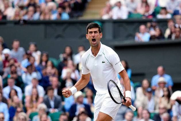 Mandatory Credit: Photo by Shutterstock (12202136ga) Novak Djokovic celebrates during his semi-final match Wimbledon Tennis Championships, Day 11, The All England Lawn Tennis and Croquet Club, London, UK - 09 Jul 2021 Wimbledon Tennis Championships, Day 11, The All England Lawn Tennis and Croquet Club, London, UK - 09 Jul 2021  Copyright: xShutterstockx 12202136ga