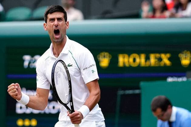 Mandatory Credit: Photo by Shutterstock (12202136ft) Novak Djokovic celebrates during his semi-final match Wimbledon Tennis Championships, Day 11, The All England Lawn Tennis and Croquet Club, London, UK - 09 Jul 2021 Wimbledon Tennis Championships, Day 11, The All England Lawn Tennis and Croquet Club, London, UK - 09 Jul 2021  Copyright: xShutterstockx 12202136ft
