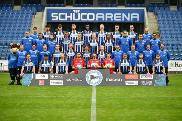 Bielefeld, Schueco Arena, 09 07 21, GER, Men, 1 Bundesliga, Season 2021 2022, DSC Arminia Bielefeld Porträttermin2021 Team photo Team photo image Front row from left Cedric Brunner, Noel Niemann, Jomaine Consbruch, Oscar Linner, Stefan Ortega Moreno, Arne Schulz, Jacob Laursen, Marcel Hartl, Vladislav Cherny Second row from left Mascot Lohmann, Frank Kramer Head coach , Ilia Gruev Co coach , Sebastian Hille Co Trainer , Sebastian Müller, Christian Gebauer, Masaya Okugawa, Sebastian Vasiliadis, Antonio Gonzalez Supervisor , Michael Schweika MSc Ost Physiotherapeut Osteopath , Mario Bertling Physiotherapist , Samuel da Costa Masseur Third row from left Marco Kostmann Goalkeeper Trainer , Stefan Kleineheismann Co Trainer , Niklas Klasen Athletics Trainer , Manuel Prietl, Joakim Nilsson, Florian Krüger, Nathan de Medina, Dr Stefan Budde Team Doctor , Dr Andreas Elsner Senior Team Doctor , Timur Nakip Video Analyst Back row from left Rafael Gameiro Video Analyst , Guilherme Ramos, Janni Serra, Fabian Klos, Bryan Lasme, Amos Pieper, Fabian Kunze, Mike van der Hoorn, Rainer Schonz Zeugwart Missing from photo Dr Tim Niedergassel Team Doctor , Philipp Heithölter Video Analyst Only for journalistic use Only for editorial use According to the regulations of the DFL Deutsche Fußball Liga it is prohibited to use or have used photographs taken in the stadium and or from the game in the form of sequence images and or video-like photo series DFL regulations prohibit any use of photographs as image sequences and or quasi video Nordrhein Westfalen Germany