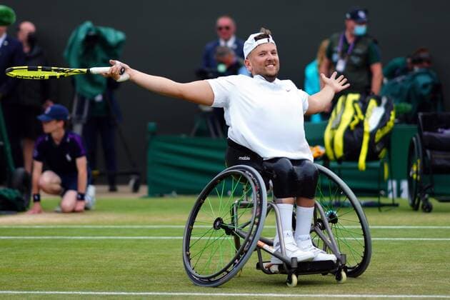 Mandatory Credit: Photo by Javier Garcia Shutterstock (12203621au) Dylan Alcott celebrates victory in the Quad Wheelchair Singles final Wimbledon Tennis Championships, Day 12, The All England Lawn Tennis and Croquet Club, London, UK - 10 Jul 2021 Wimbledon Tennis Championships, Day 12, The All England Lawn Tennis and Croquet Club, London, UK - 10 Jul 2021  Copyright: xJavierxGarcia Shutterstockx 12203621au