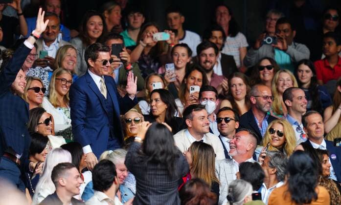 Mandatory Credit: Photo by Javier Garcia Shutterstock (12203621fe) Tom Cruise waves to the crowd on Centre Court during the Ladies Singles final Wimbledon Tennis Championships, Day 12, The All England Lawn Tennis and Croquet Club, London, UK - 10 Jul 2021 Wimbledon Tennis Championships, Day 12, The All England Lawn Tennis and Croquet Club, London, UK - 10 Jul 2021  Copyright: xJavierxGarcia Shutterstockx 12203621fe