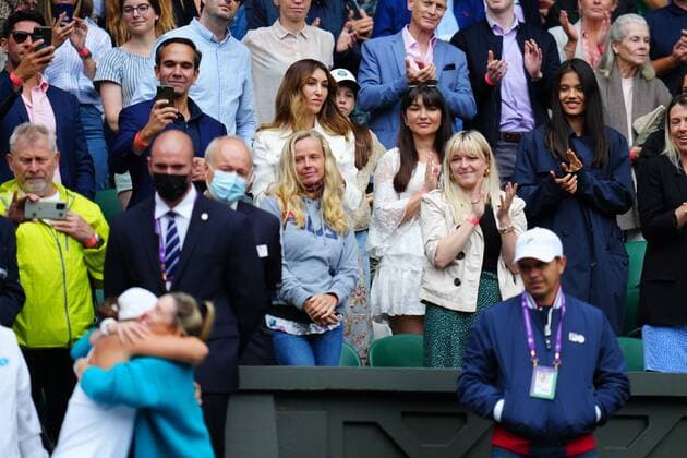Mandatory Credit: Photo by Javier Garcia Shutterstock (12203621gb) Emma Raducanu looks on as Ashleigh Barty celebrates after victory in the Ladies Singles final Wimbledon Tennis Championships, Day 12, The All England Lawn Tennis and Croquet Club, London, UK - 10 Jul 2021 Wimbledon Tennis Championships, Day 12, The All England Lawn Tennis and Croquet Club, London, UK - 10 Jul 2021  Copyright: xJavierxGarcia Shutterstockx 12203621gb