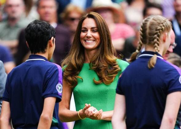 Mandatory Credit: Photo by Javier Garcia Shutterstock (12203621fx) Catherine Duchess of Cambridge chatting with ballboys and ball girls on Centre Court before the trophy presentation Wimbledon Tennis Championships, Day 12, The All England Lawn Tennis and Croquet Club, London, UK - 10 Jul 2021 Wimbledon Tennis Championships, Day 12, The All England Lawn Tennis and Croquet Club, London, UK - 10 Jul 2021  Copyright: xJavierxGarcia Shutterstockx 12203621fx