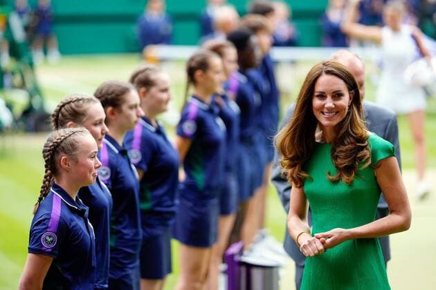 Mandatory Credit: Photo by Shutterstock (12203622bm) Catherine Duchess of Cambridge chatting with ballboys and ball girls on Centre Court before the trophy presentation Wimbledon Tennis Championships, Day 12, The All England Lawn Tennis and Croquet Club, London, UK - 10 Jul 2021 Wimbledon Tennis Championships, Day 12, The All England Lawn Tennis and Croquet Club, London, UK - 10 Jul 2021  Copyright: xShutterstockx 12203622bm