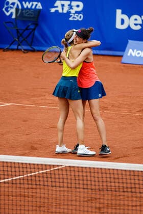 210710 Mirjam Björklund, Sweden, and Leonie Kung, Switzerland, rejoice in the doubles final on day 6 of the Nordea Open on July 10, 2021 in Bastad,  Copyright: MATHILDAxAHLBERG BB210710BB795