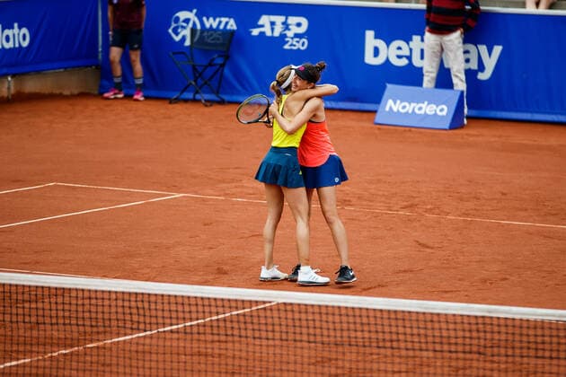 210710 Mirjam Björklund, Sweden, and Leonie Kung, Switzerland, rejoice in the doubles final on day 6 of the Nordea Open on July 10, 2021 in Bastad,  Copyright: MATHILDAxAHLBERG BB210710BB796