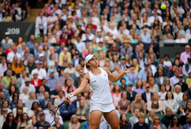 Mandatory Credit: Photo by Shutterstock (12203623s) Ashleigh Barty of Australia in action Wimbledon Tennis Championships, Day 12, The All England Lawn Tennis and Croquet Club, London, UK - 10 Jul 2021 Wimbledon Tennis Championships, Day 12, The All England Lawn Tennis and Croquet Club, London, UK - 10 Jul 2021  Copyright: xShutterstockx 12203623s