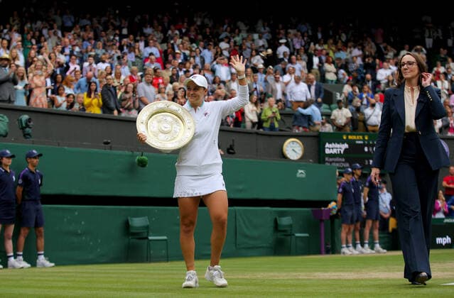 Mandatory Credit: Photo by Shutterstock (12203623f) Ashleigh Barty of Australia parades with the trophy Wimbledon Tennis Championships, Day 12, The All England Lawn Tennis and Croquet Club, London, UK - 10 Jul 2021 Wimbledon Tennis Championships, Day 12, The All England Lawn Tennis and Croquet Club, London, UK - 10 Jul 2021  Copyright: xShutterstockx 12203623f